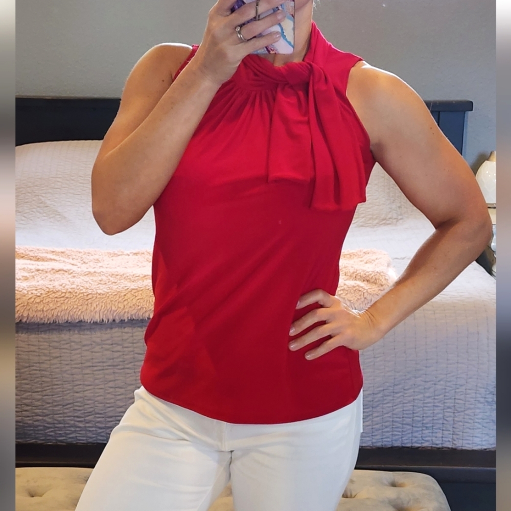 Red sleeveless blouse